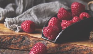 Preview wallpaper raspberries, berries, fruits, wood, table