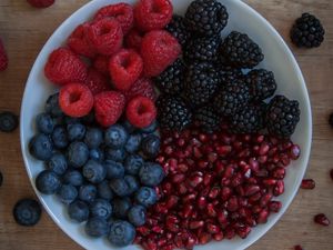 Preview wallpaper raspberries, blueberries, blackberries, pomegranate, berries, bowl