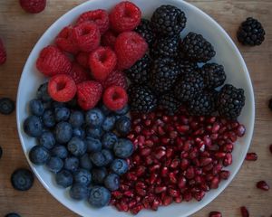 Preview wallpaper raspberries, blueberries, blackberries, pomegranate, berries, bowl