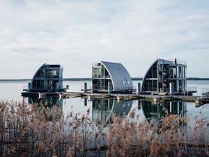 Preview wallpaper reeds, lake, pier, buildings