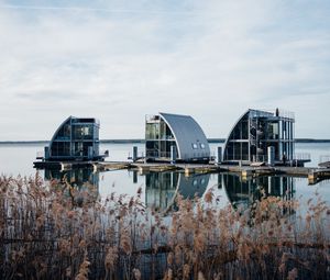 Preview wallpaper reeds, lake, pier, buildings