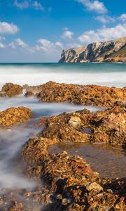 Preview wallpaper reefs, sea, mountains, long exposure