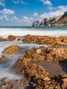 Preview wallpaper reefs, sea, mountains, long exposure