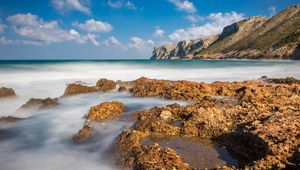 Preview wallpaper reefs, sea, mountains, long exposure