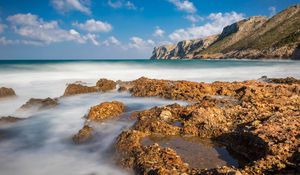 Preview wallpaper reefs, sea, mountains, long exposure