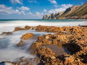 Preview wallpaper reefs, sea, mountains, long exposure