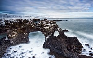Preview wallpaper reeves, arches, stony, coast, cold, snow, haze, emptiness