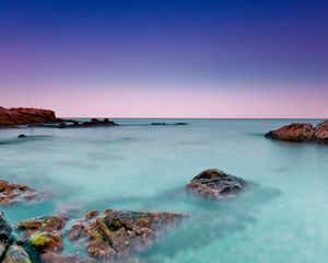 Preview wallpaper reeves, water, azure, horizon, line, stones, sky, dark blue, morning