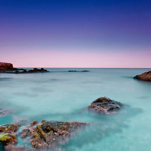 Preview wallpaper reeves, water, azure, horizon, line, stones, sky, dark blue, morning