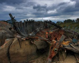 Preview wallpaper remains, boat, framework, stones, cloudy