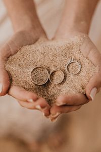 Preview wallpaper rings, hands, sand, palms