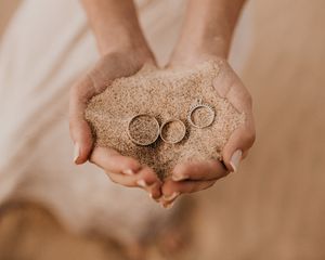 Preview wallpaper rings, hands, sand, palms