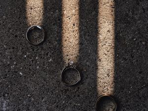 Preview wallpaper rings, rays, asphalt, light