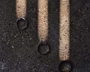Preview wallpaper rings, rays, asphalt, light