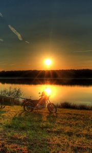 Preview wallpaper river, bike, sunset, grass