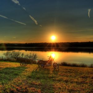 Preview wallpaper river, bike, sunset, grass