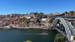 Preview wallpaper river, boat, buildings, city, bridge