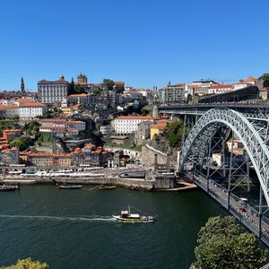 Preview wallpaper river, boat, buildings, city, bridge