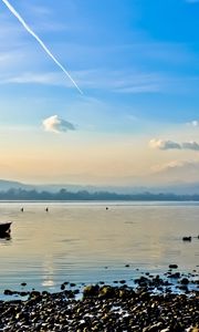 Preview wallpaper river, boat, landscape, stones, coast, sky, line