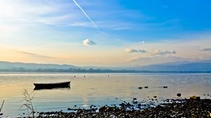 Preview wallpaper river, boat, landscape, stones, coast, sky, line