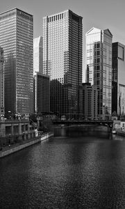 Preview wallpaper river, bridge, buildings, city, black and white