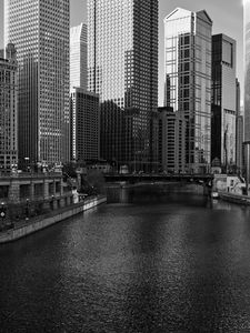 Preview wallpaper river, bridge, buildings, city, black and white