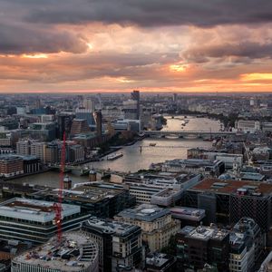 Preview wallpaper river, bridge, buildings, city, sunrise