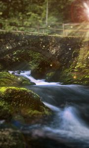 Preview wallpaper river, bridge, sunlight, flare, stones