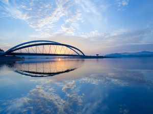 Preview wallpaper river, bridge, sunset, sky