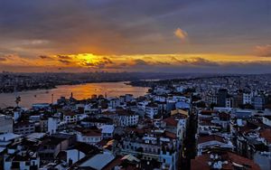 Preview wallpaper river, buildings, houses, city, clouds, sunrise