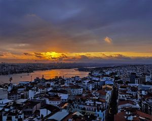 Preview wallpaper river, buildings, houses, city, clouds, sunrise