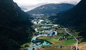 Preview wallpaper river, buildings, village, mountains, winding