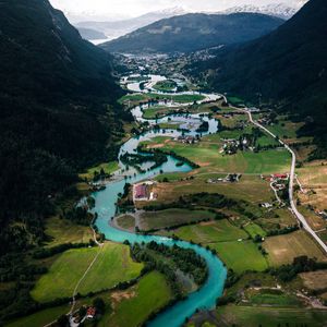 Preview wallpaper river, buildings, village, mountains, winding