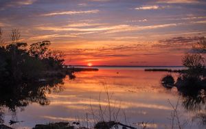 Preview wallpaper river, bushes, horizon, sunset, dark