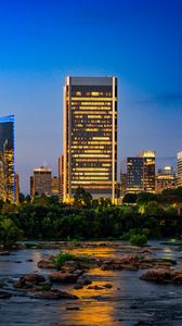 Preview wallpaper river, city, buildings, light, evening, dark