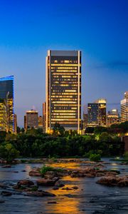 Preview wallpaper river, city, buildings, light, evening, dark