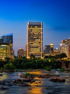 Preview wallpaper river, city, buildings, light, evening, dark