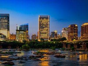 Preview wallpaper river, city, buildings, light, evening, dark