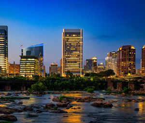 Preview wallpaper river, city, buildings, light, evening, dark