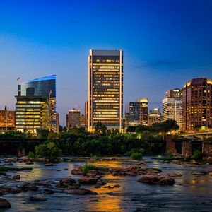 Preview wallpaper river, city, buildings, light, evening, dark