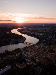 Preview wallpaper river, city, sunset, roofs