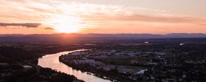 Preview wallpaper river, city, sunset, roofs