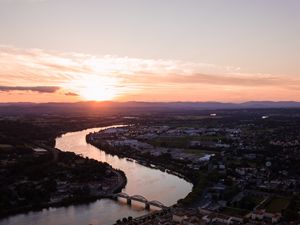 Preview wallpaper river, city, sunset, roofs