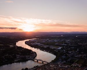 Preview wallpaper river, city, sunset, roofs