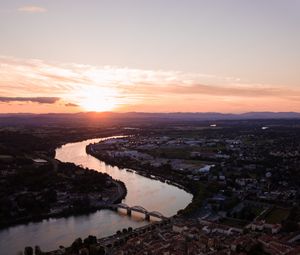 Preview wallpaper river, city, sunset, roofs