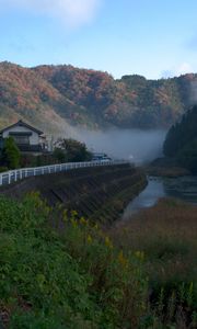 Preview wallpaper river, coast, road, slope, forest, fog