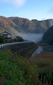 Preview wallpaper river, coast, road, slope, forest, fog