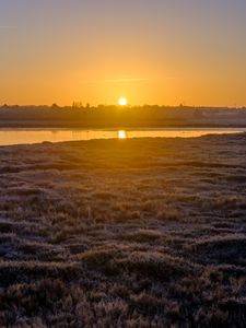Preview wallpaper river, coast, sunset, sun, landscape
