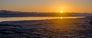 Preview wallpaper river, coast, sunset, sun, landscape