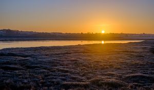 Preview wallpaper river, coast, sunset, sun, landscape